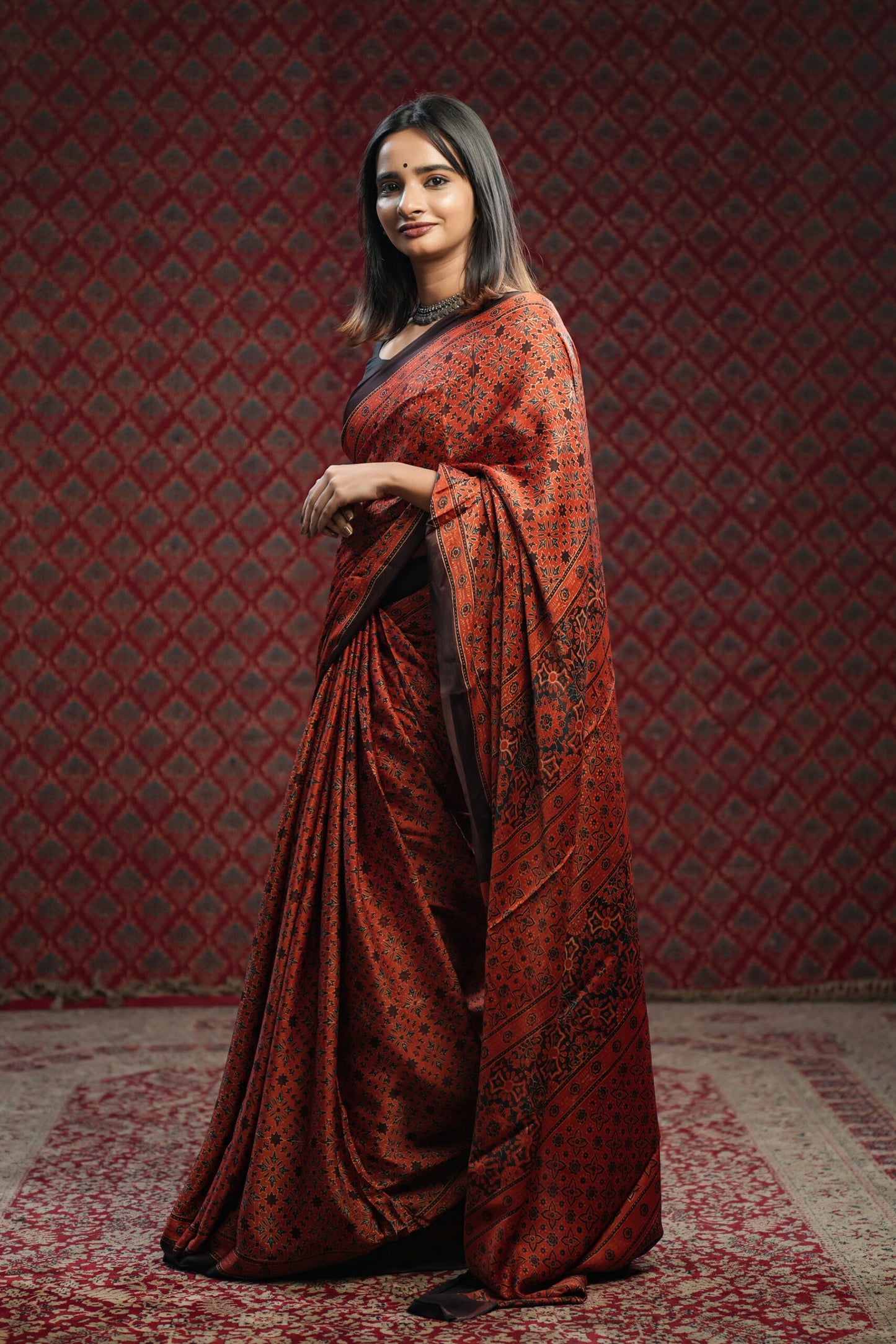 Red base Ajrakh Printed Modal Silk Saree with Blue & Brown Floral Print