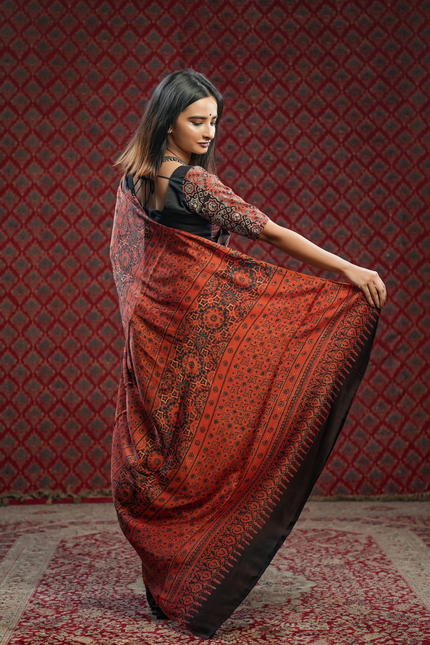 Red base Ajrakh Printed Modal Silk Saree with Blue & Brown Floral Print