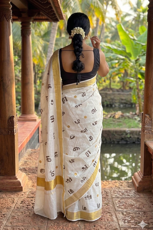 Offwhite Kasavu Saree with Aksharamala Print