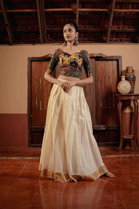 Offwhite Kerala Kasavu Skirt and Ajrakh Patch Blouse
