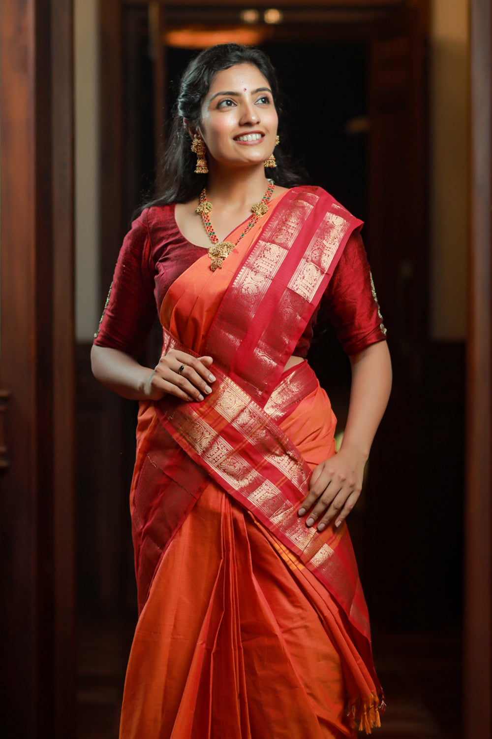 Kanchi Cotton Orange Saree with Red Border