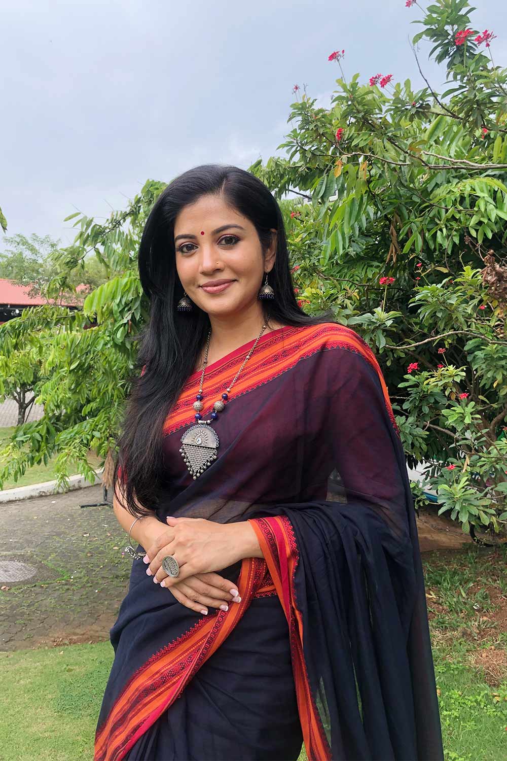 Black Handloom Cotton Saree With Red And Orange Border