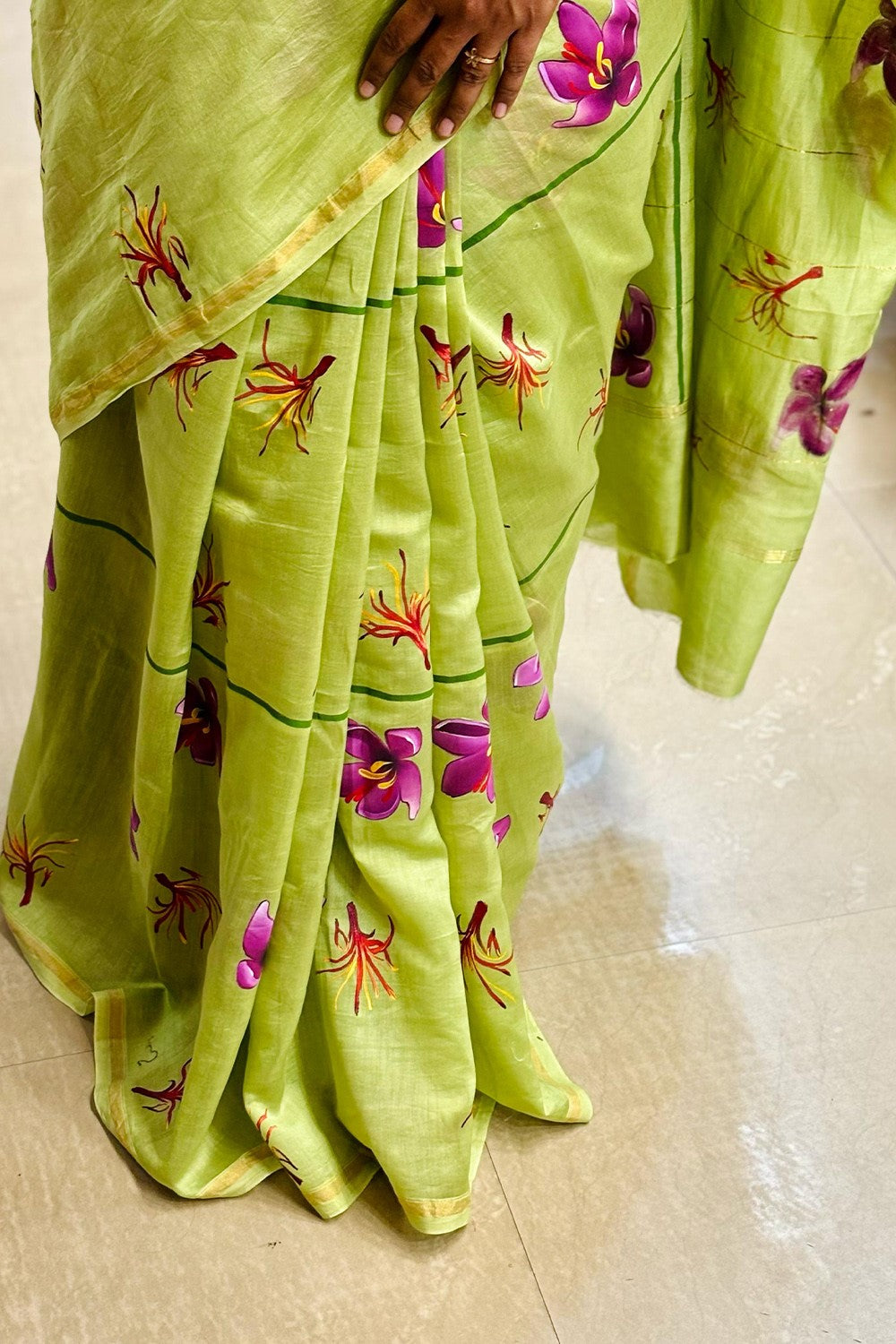 Green chanderi saffron handpainted saree