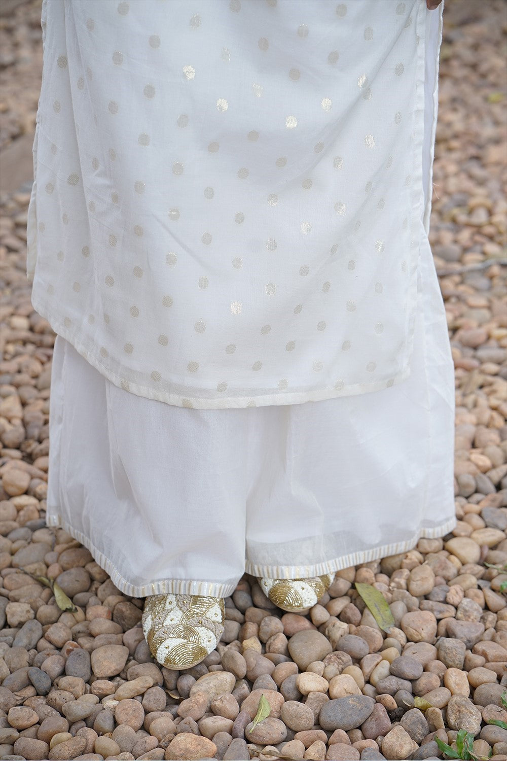 Off White Side Slitted Kurthi with Golden Butta