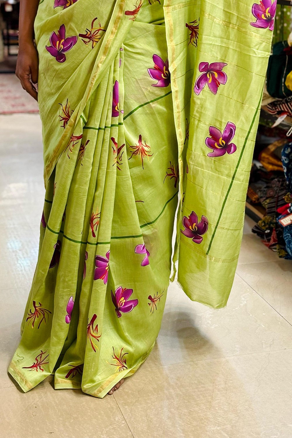Green chanderi saffron handpainted saree