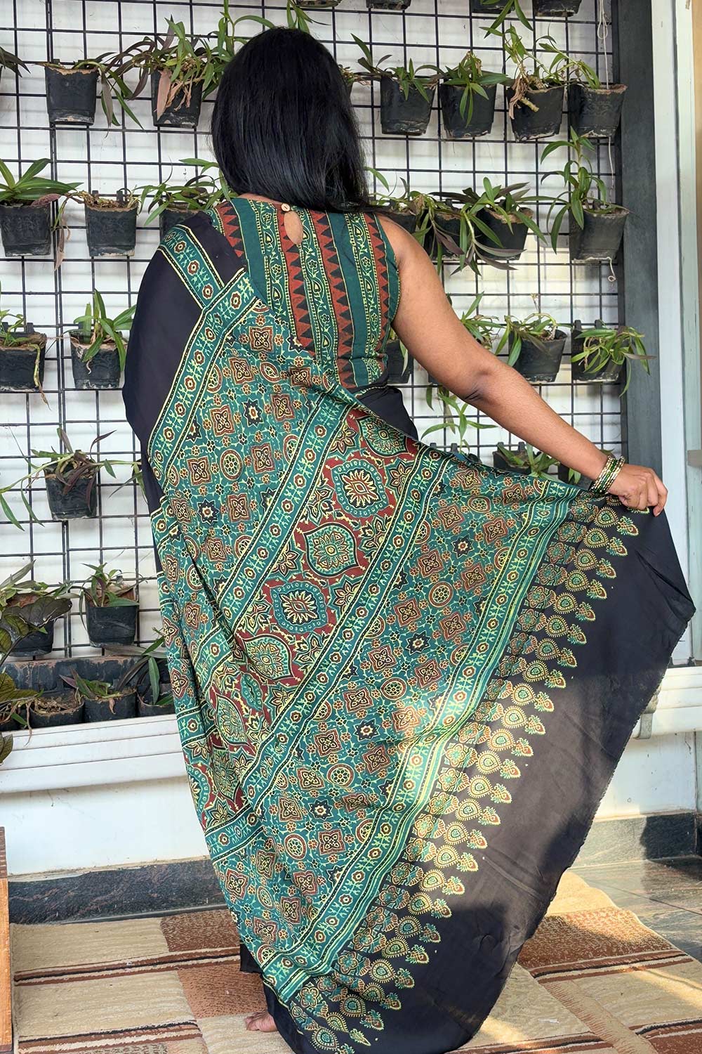 Modal silk Plain Black Body and green Ajrkh Printed Saree