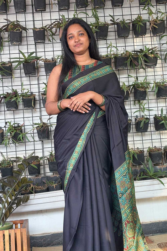 Modal silk Plain Black Body and green Ajrkh Printed Saree