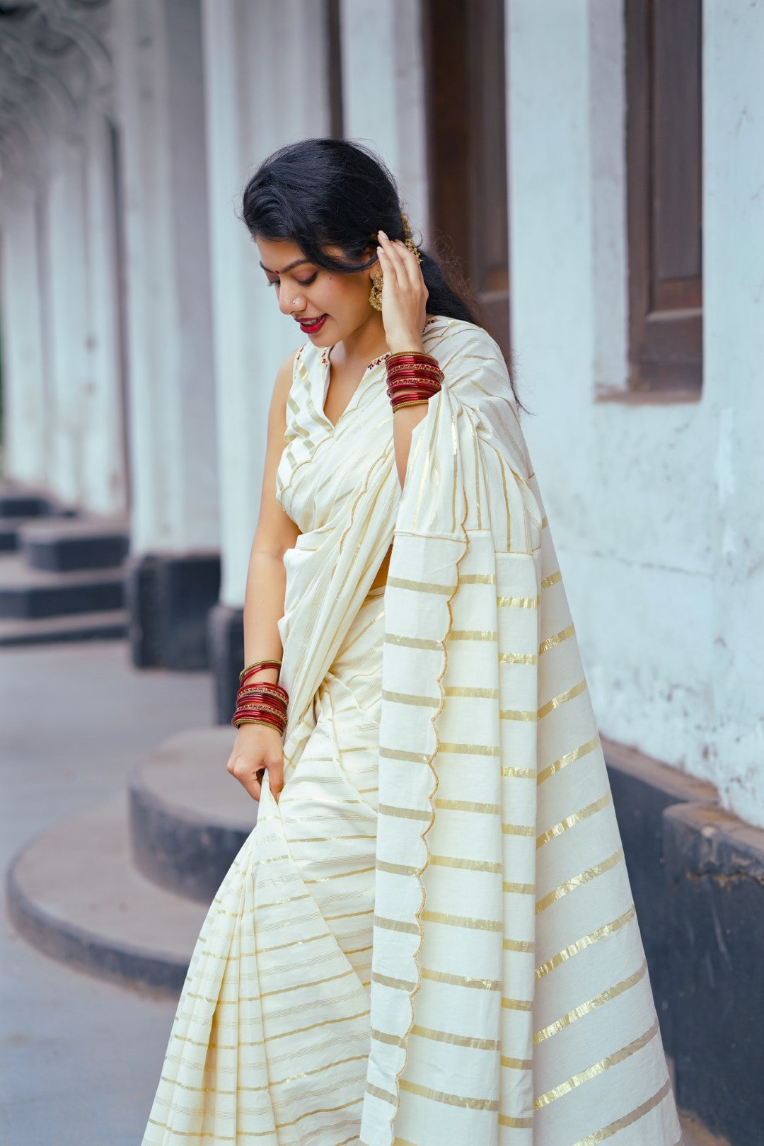 Off white Striped Zari Sleevless Blouse