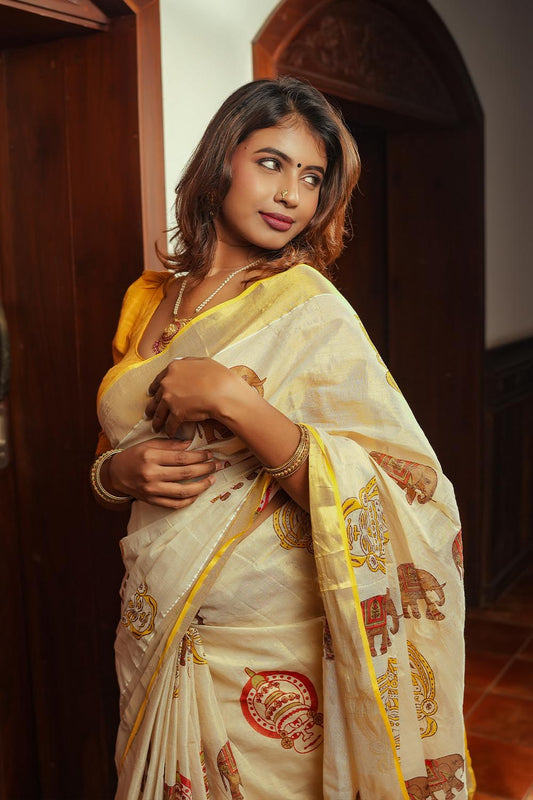 Golden Tissue 3 Inch Gold Border & Gaja Kathakali Print Saree
