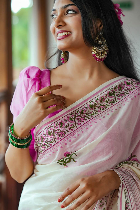 Offwhite Puliyilakara Pink Border & Floral Print Saree