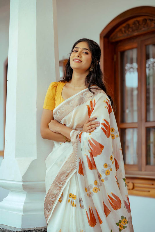 Offwthite Saree with Thrikkarappan & Flower Block Print