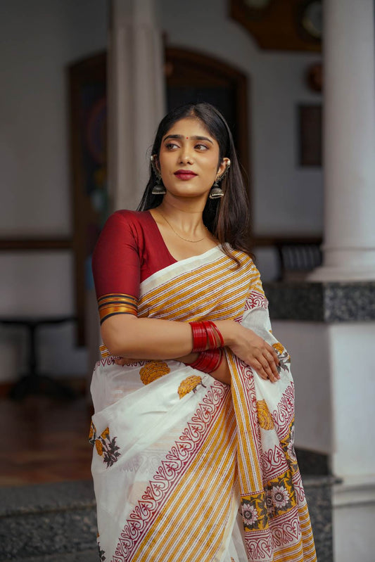 Offwhite Chanderisilk Saree with Marrie Gold Floral Motif