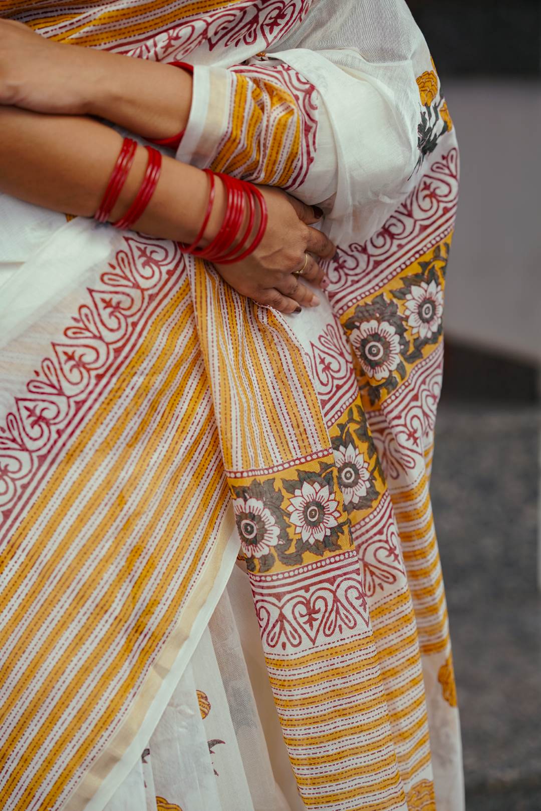 Offwhite Chanderisilk Saree with Marrie Gold Floral Motif