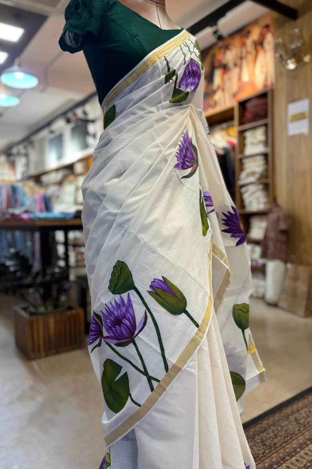Kerala Saree with Golden Border & Handpainted Blue Water Lily