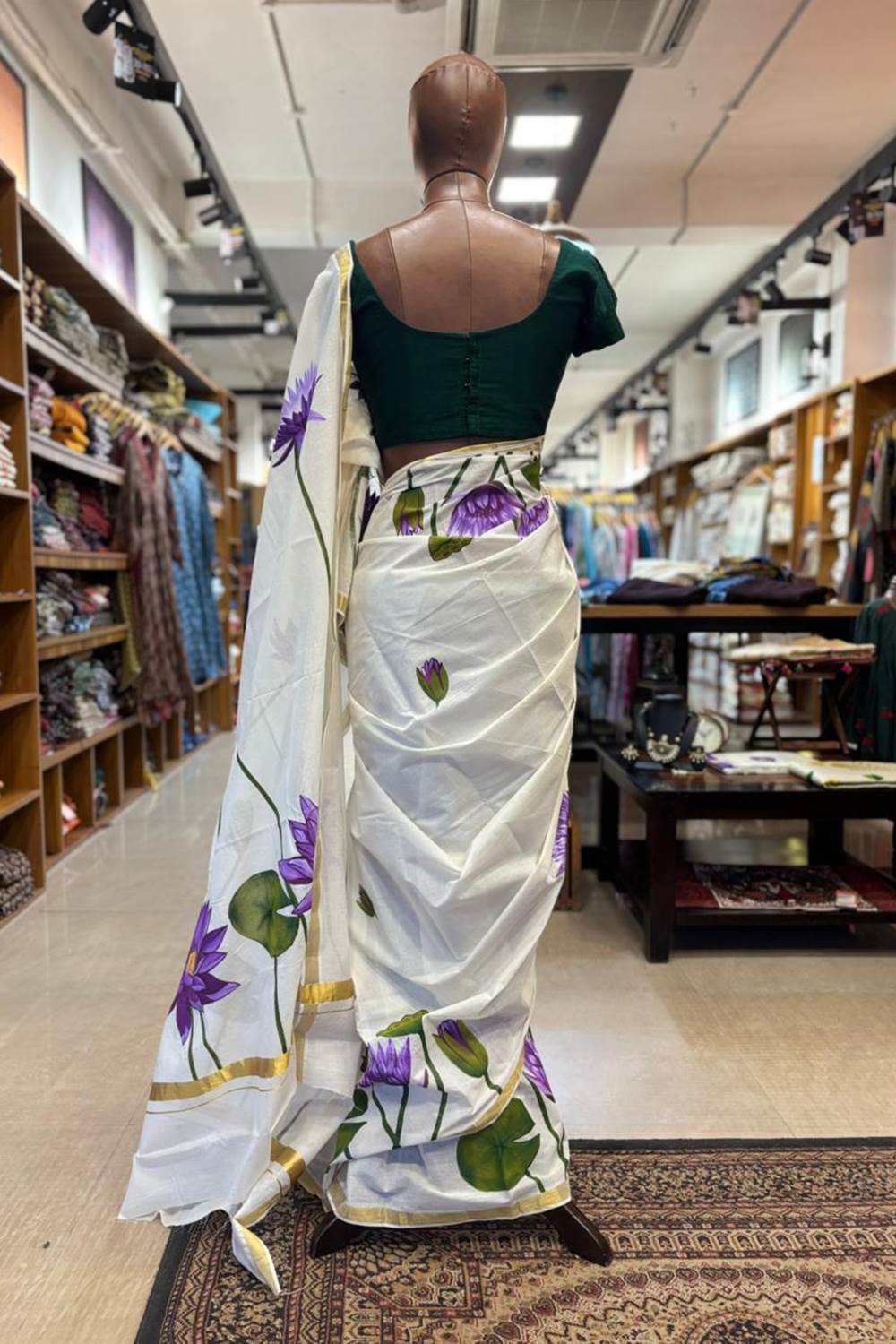 Kerala Saree with Golden Border & Handpainted Blue Water Lily