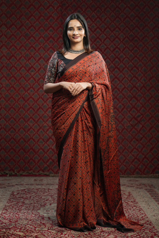 Red base Ajrakh Printed Modal Silk Saree with Blue & Brown Floral Print