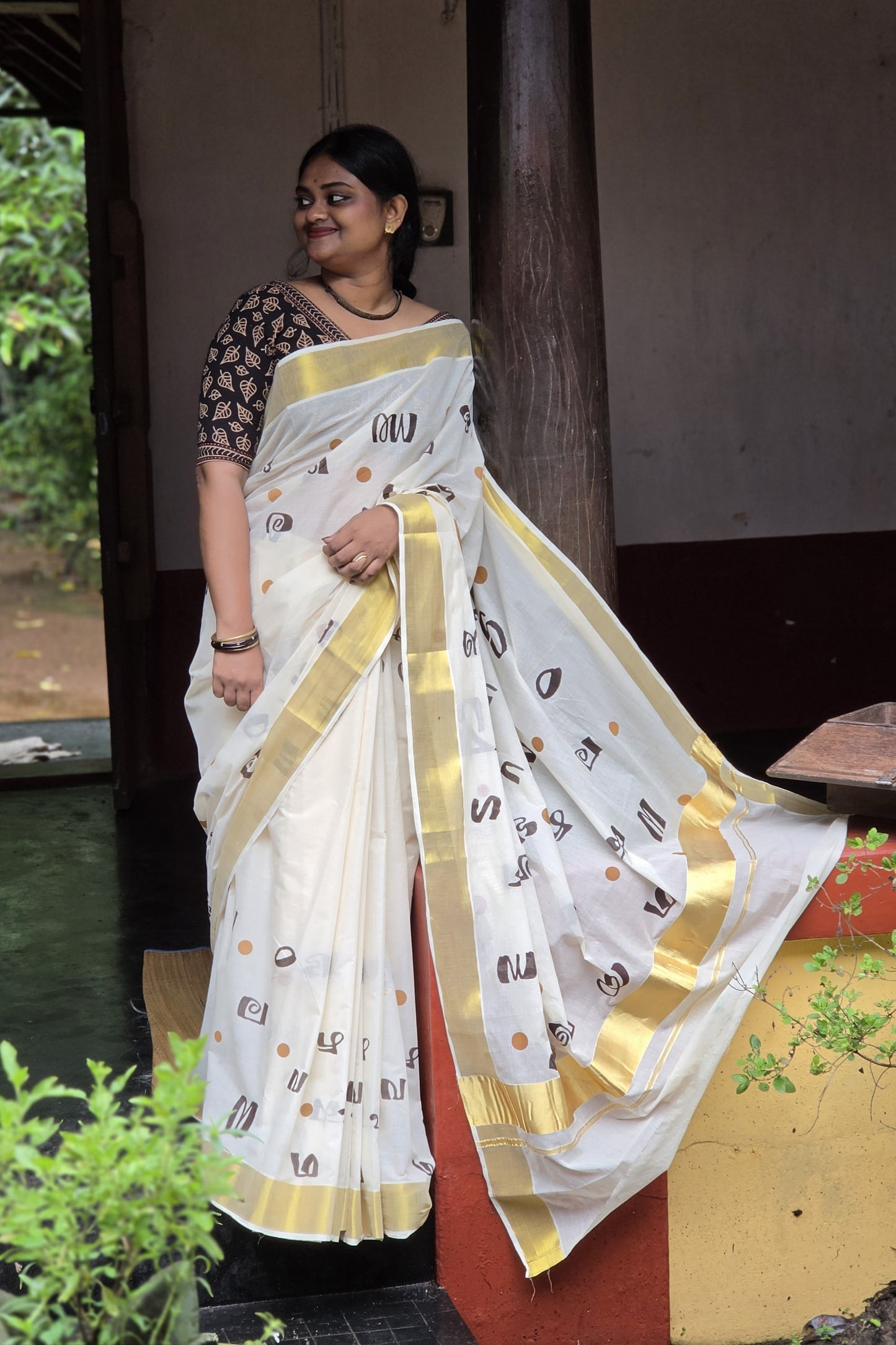 Offwhite Kasavu Saree with Aksharamala Print