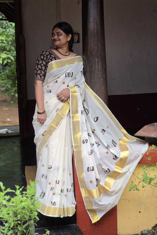 Offwhite Kasavu Saree with Aksharamala Print