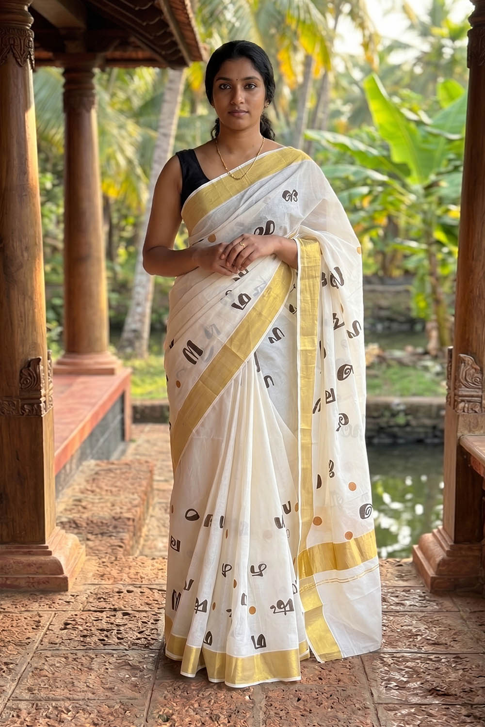 Offwhite Kasavu Saree with Aksharamala Print