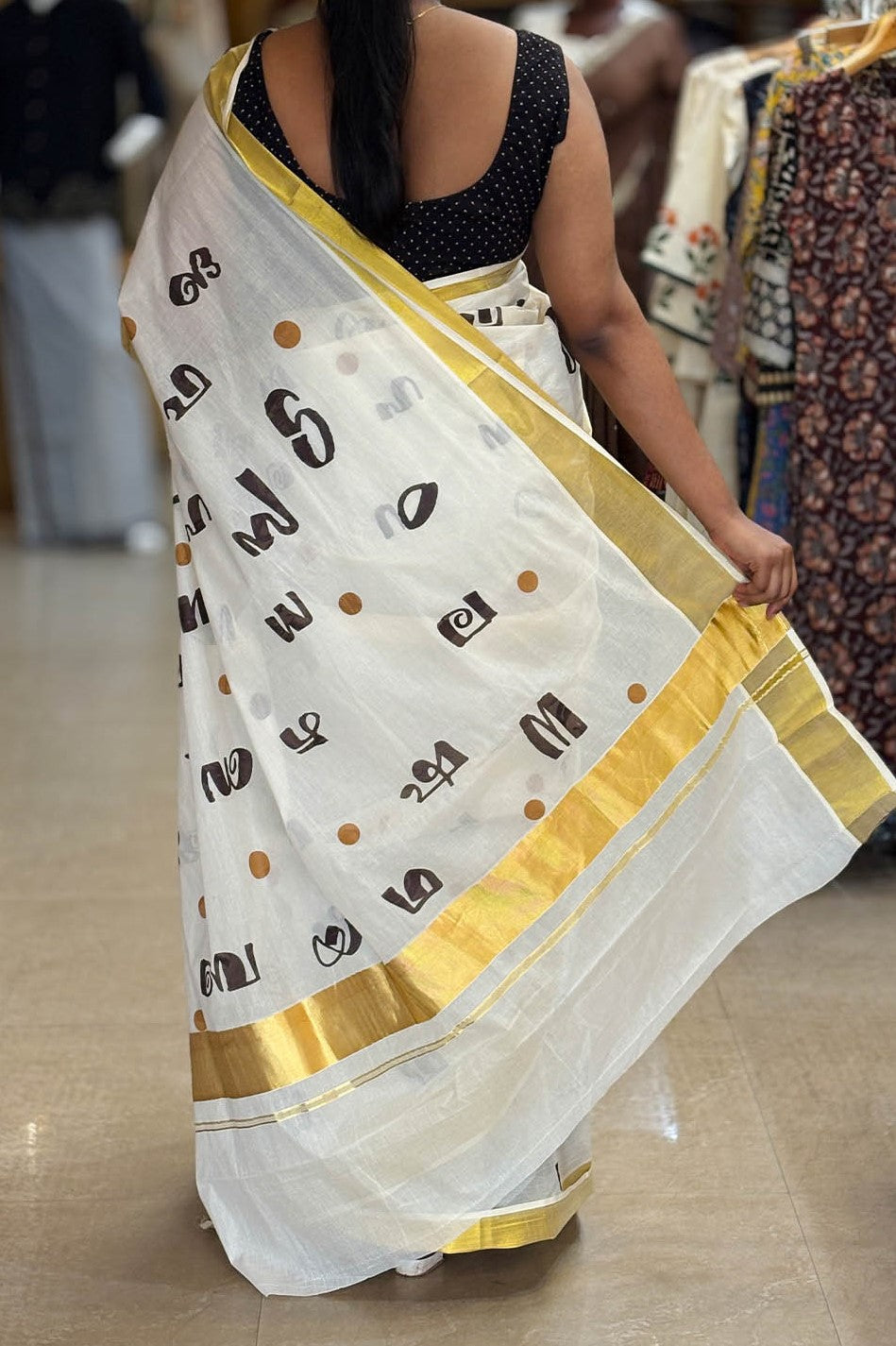 Offwhite Kasavu Saree with Aksharamala Print