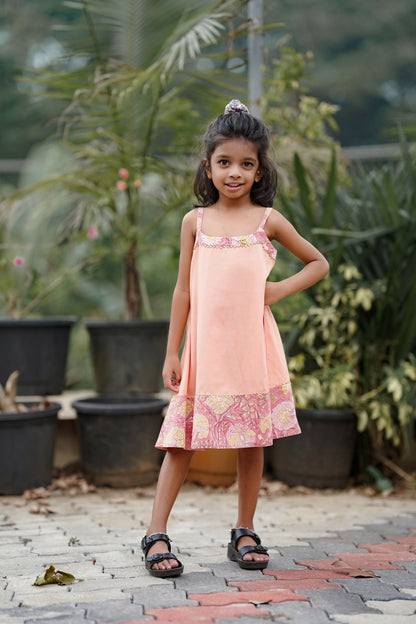 Peach plain frock with sanganeri