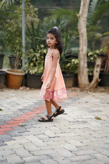 Peach plain frock with sanganeri