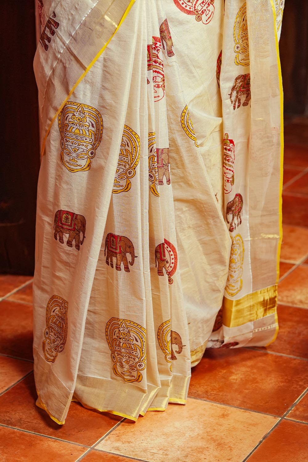 Golden Tissue 3 Inch Gold Border & Gaja Kathakali Print Saree