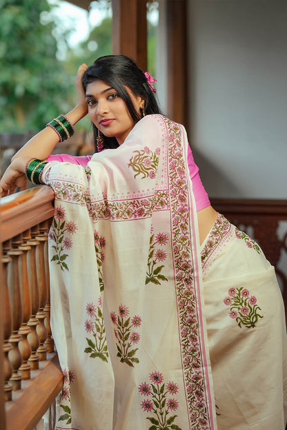 Offwhite Puliyilakara Pink Border & Floral Print Saree