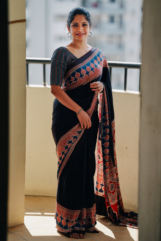 Black Plain Ajrakh Modal Saree with Blue & Red Boarder and Pallu