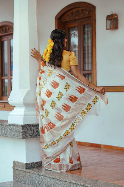 Offwthite Saree with Thrikkarappan & Flower Block Print