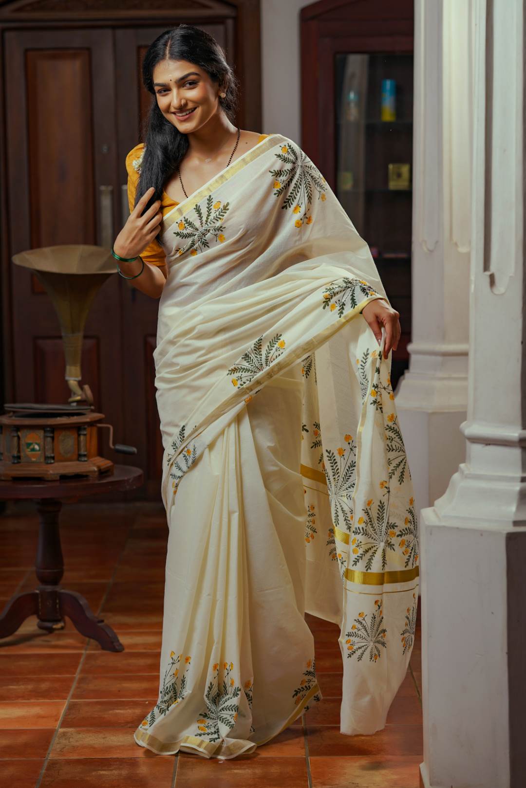 Offwhite Golden Kasavu Saree with Mukutti Floral Handblock Print