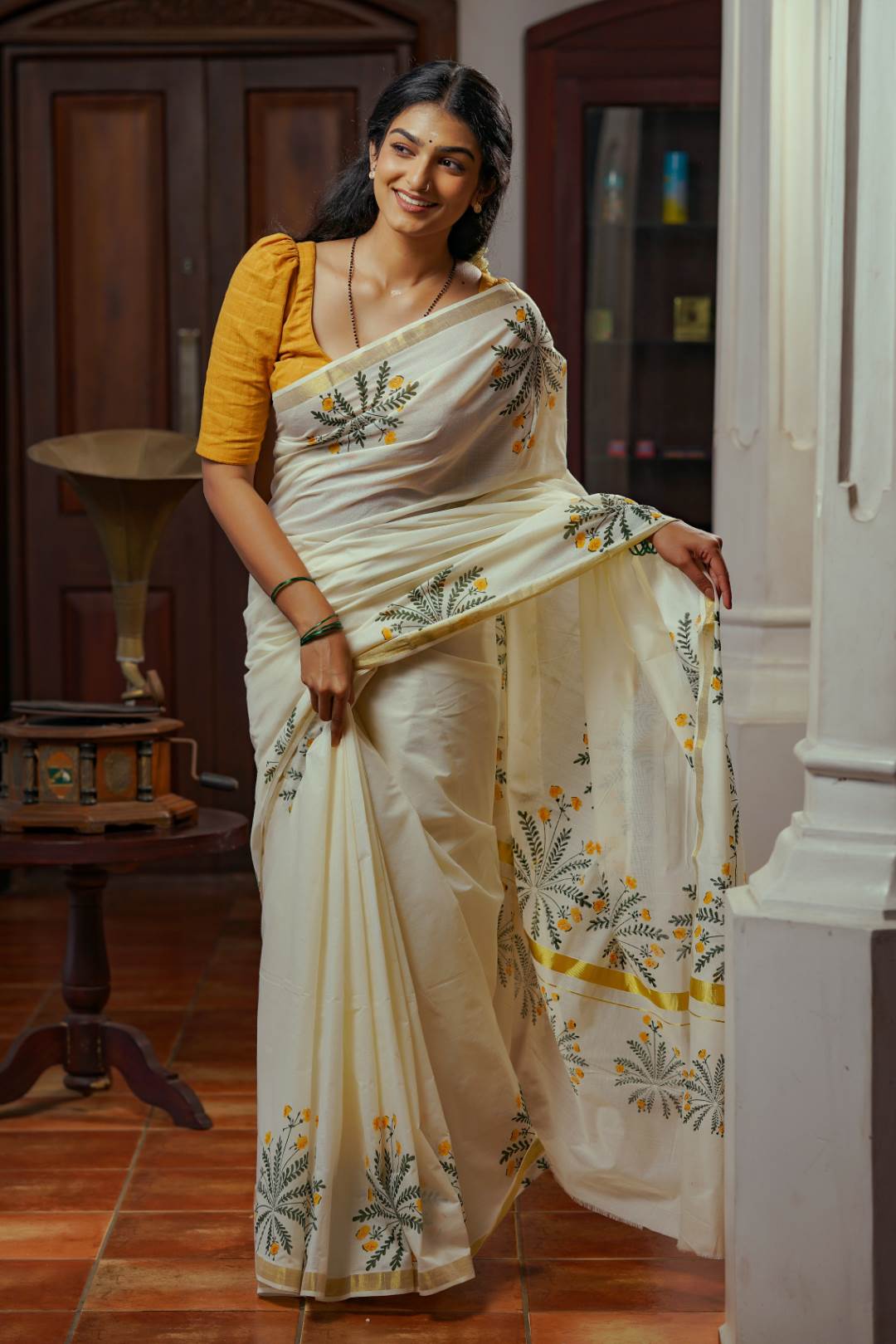 Offwhite Golden Kasavu Saree with Mukutti Floral Handblock Print