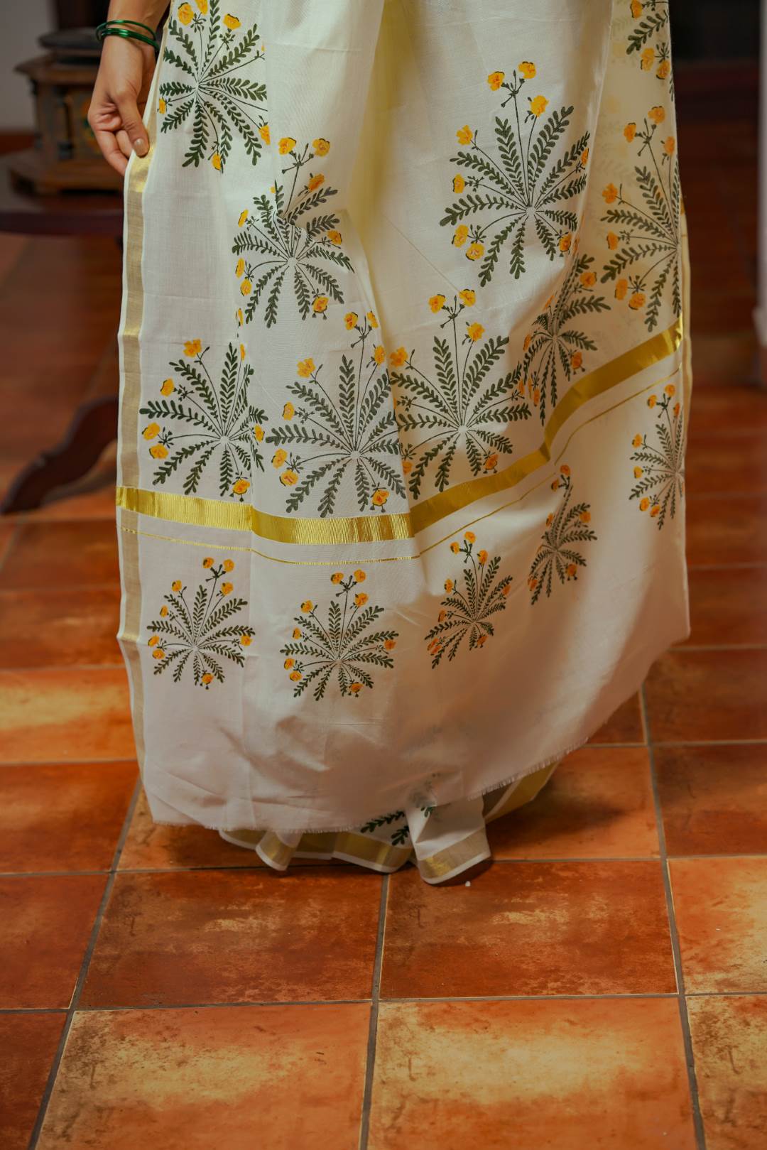 Offwhite Golden Kasavu Saree with Mukutti Floral Handblock Print
