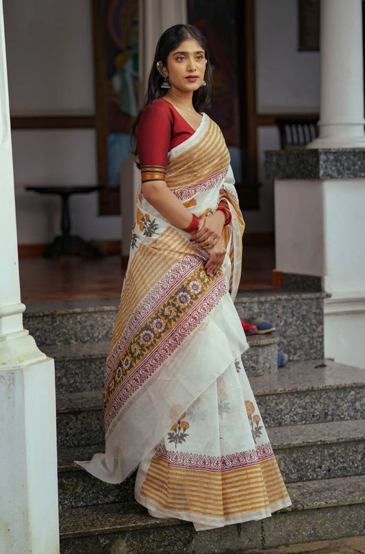 Offwhite Chanderisilk Saree with Marrie Gold Floral Motif