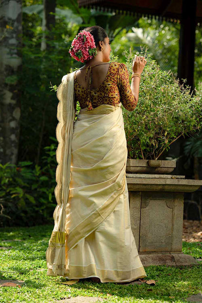 Kerala Tissue Saree with Scallops