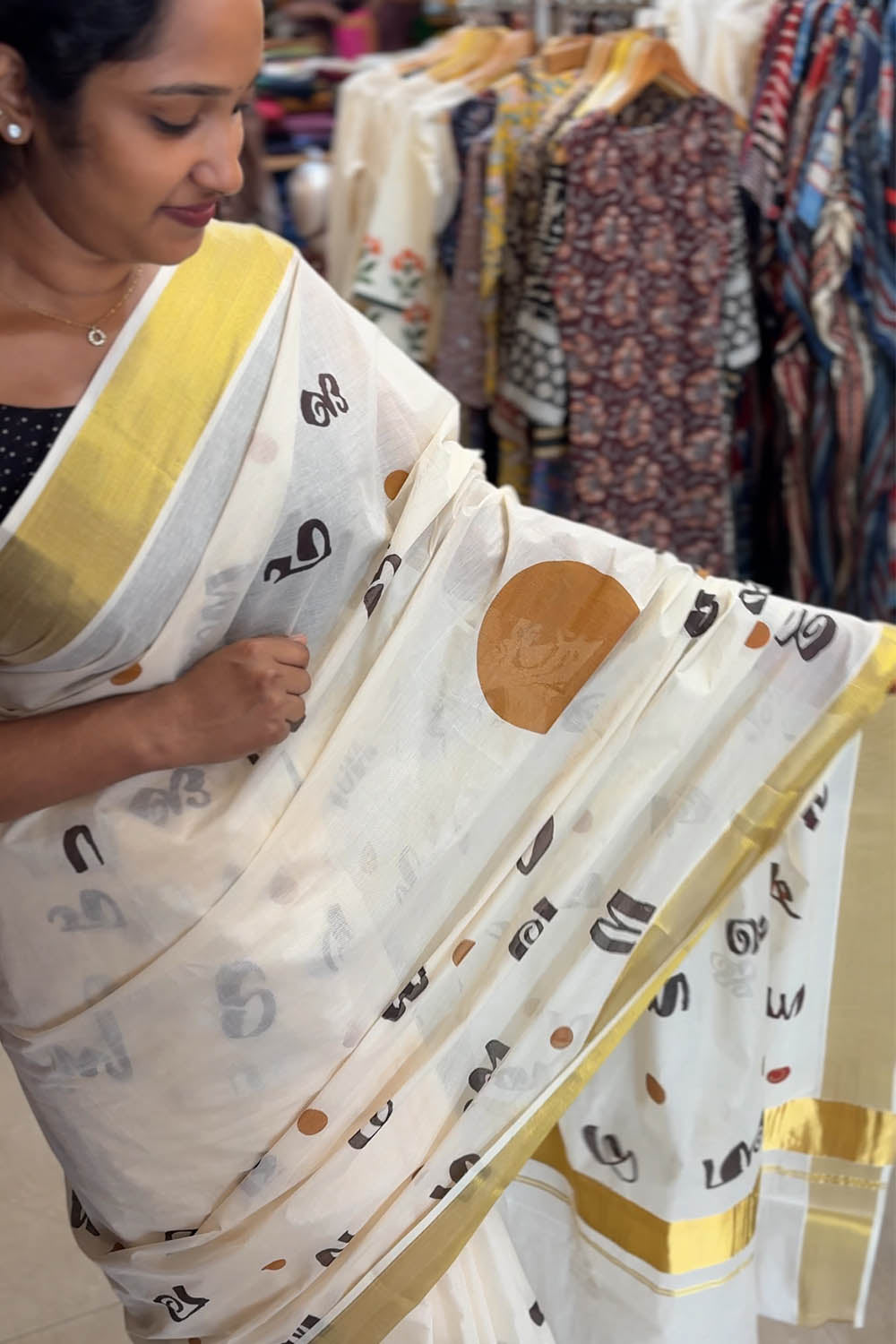 Offwhite Kasavu Saree with Aksharamala Print