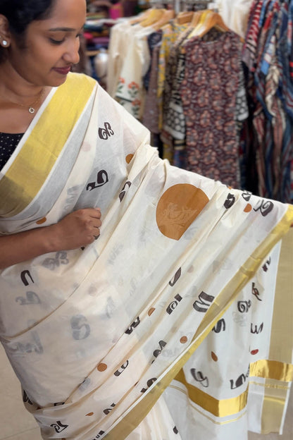 Offwhite Kasavu Saree with Aksharamala Print