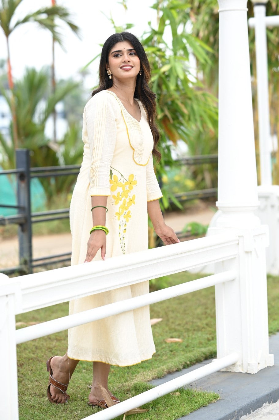 Offwhite Aline Kurti with Kanikonna Handpainted