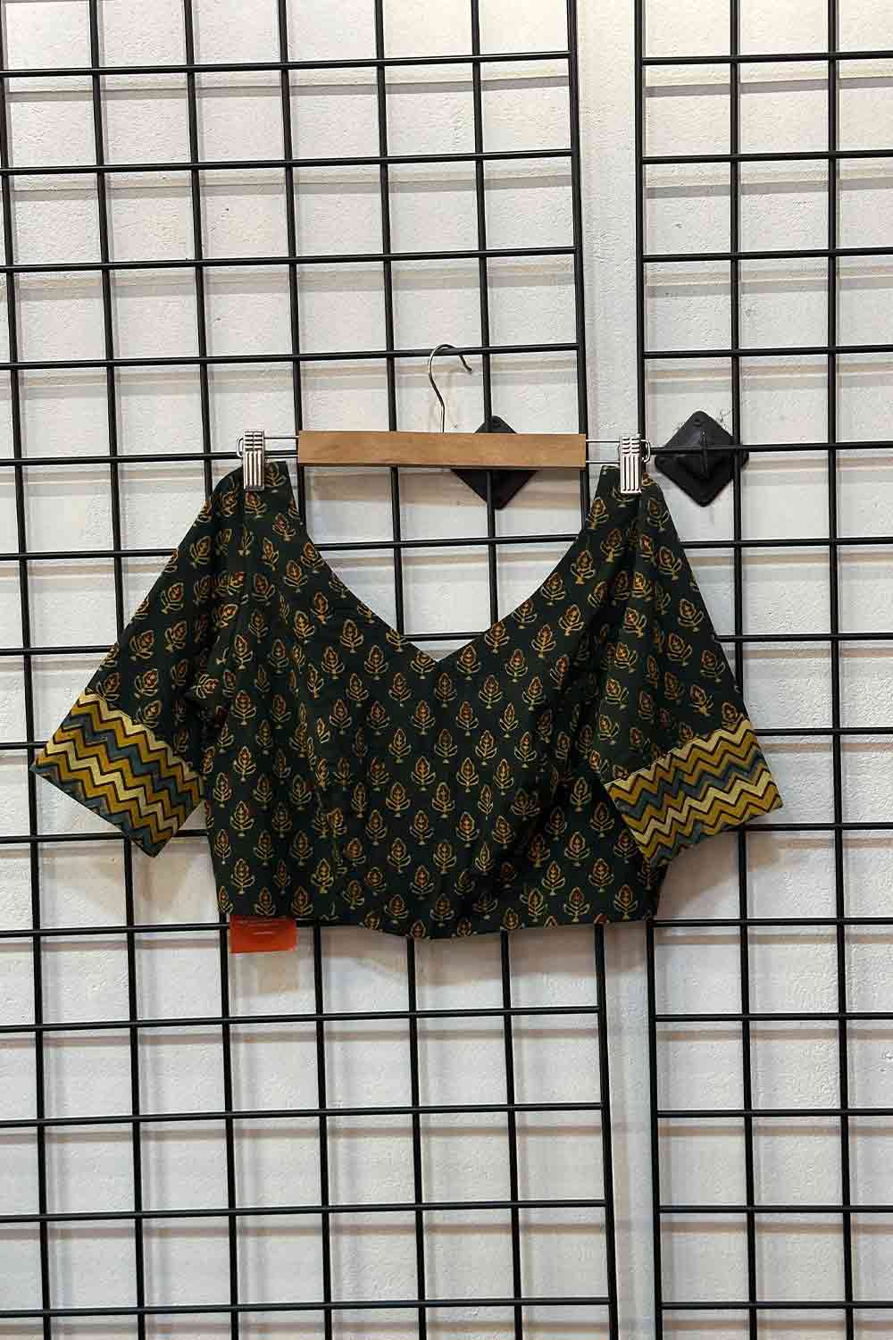 Green Base Yellow And Red Motif Blouse