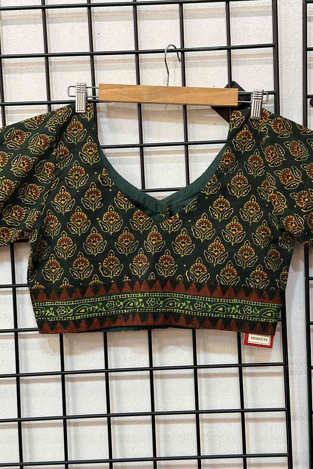 Green Base Yellow And Red Motif Blouse