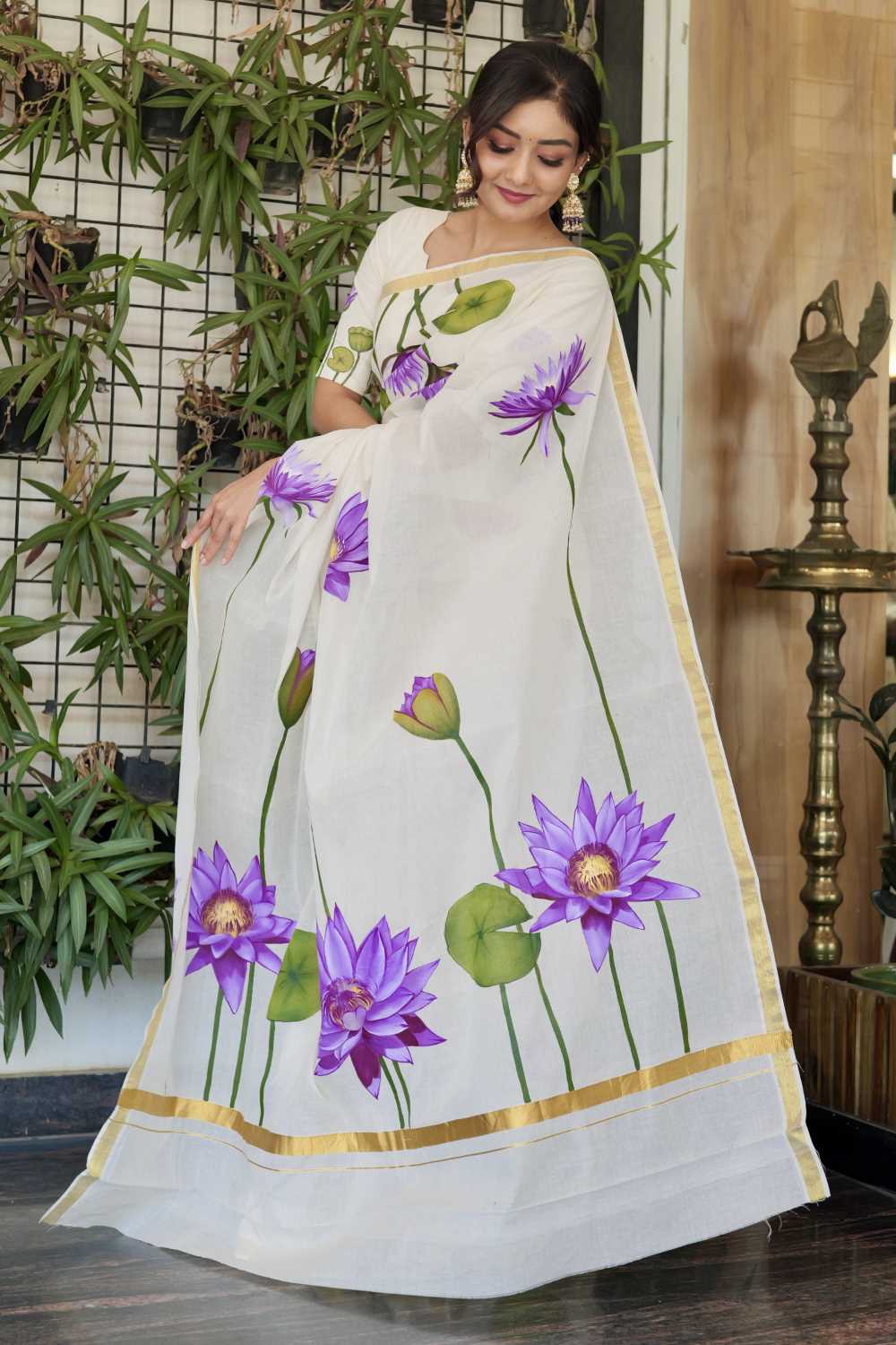 Kerala Saree with Golden Border & Handpainted Blue Water Lily
