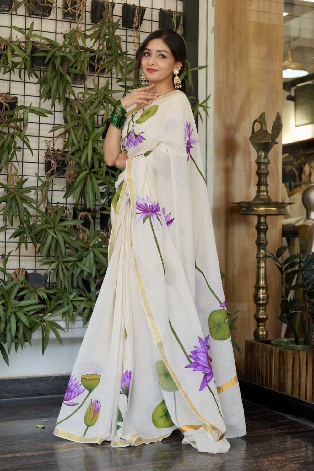 Kerala Saree with Golden Border & Handpainted Blue Water Lily