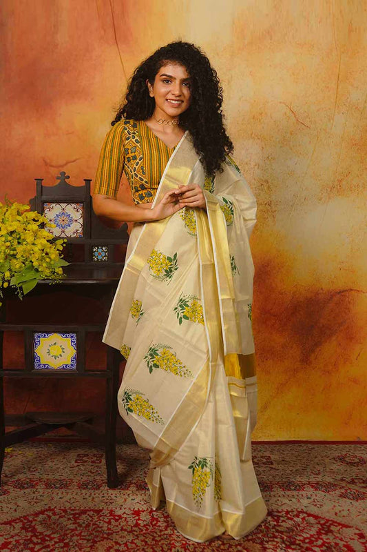 Kerala Golden Tissue Saree with Golden Shower Floral Print